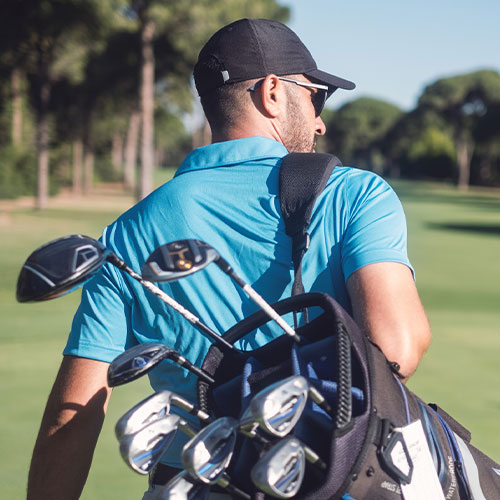 Golfer walking the course pain free after care from the back specialist Dr; Dipan in Parsippany-Troy Hills